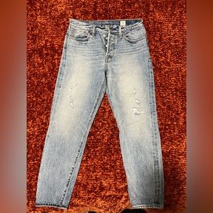 Levi jeans in size 27. Lightly used, in great condition. Distressed denim.
